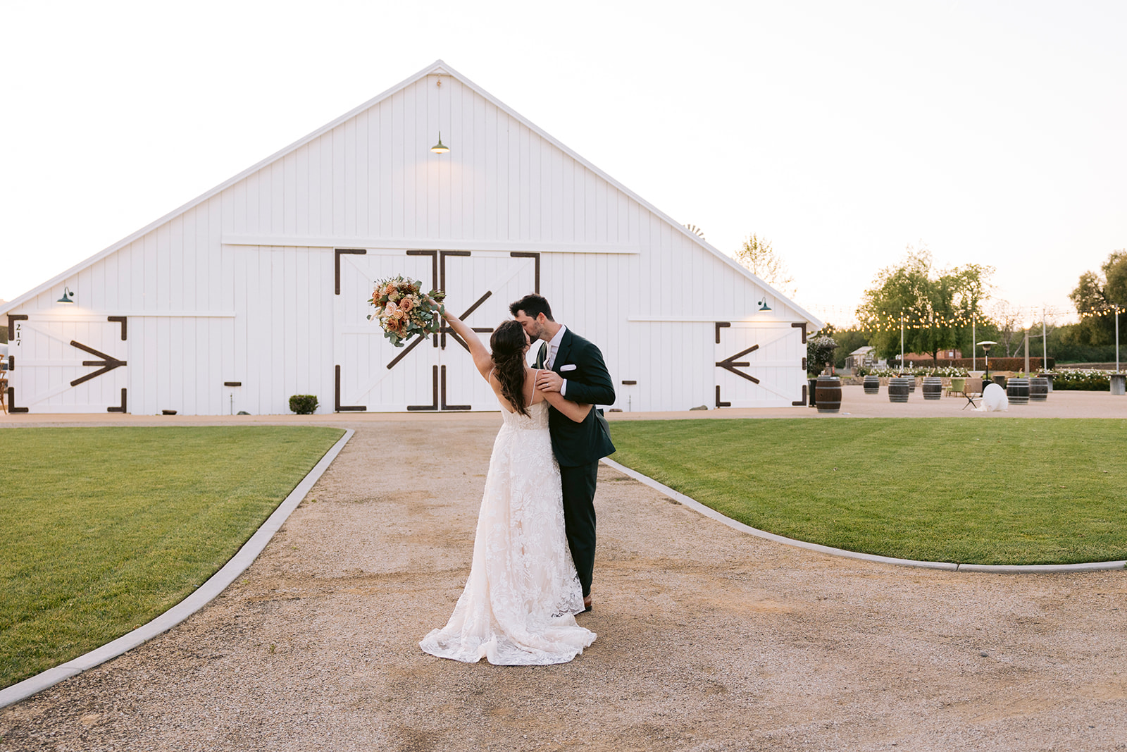 San Luis Obispo photographer captures bride and groom in front of White Barn